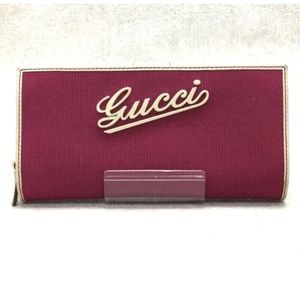 RARE GUCCI long pink wallet with rubber logo